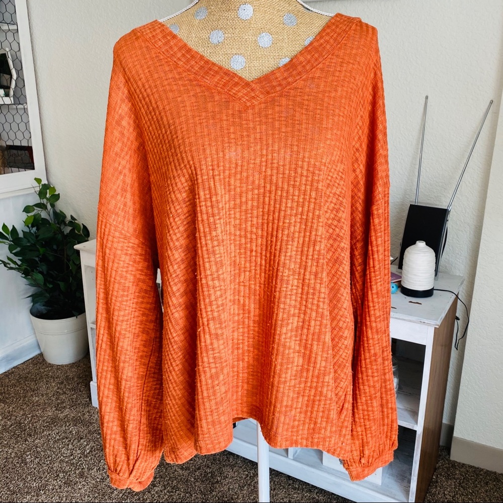 Ridged stretchy orange long sleeve top